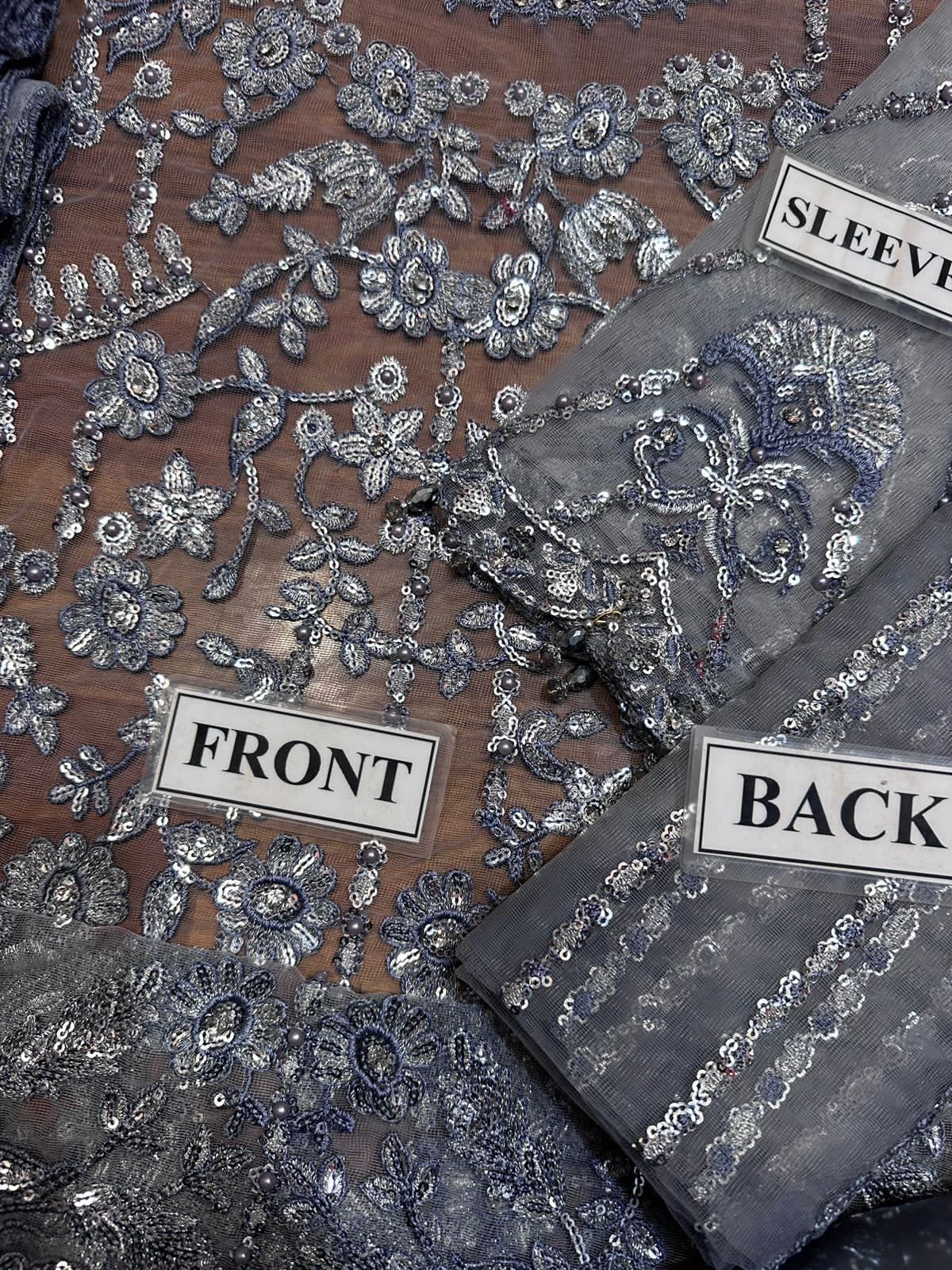 Unstitched Embroidered Three Piece Suit